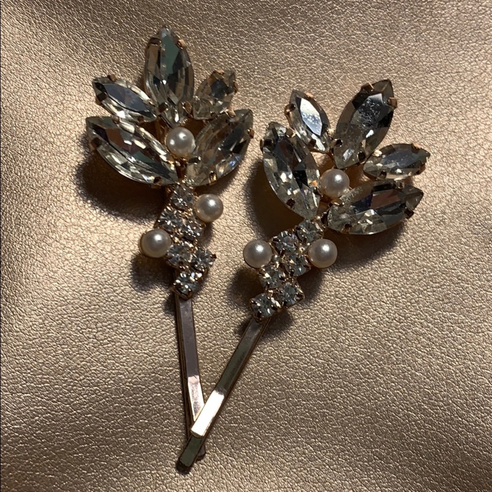 Two rose gold hair clips used only once